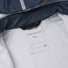 Veste de pluie enfant pratique et durable Lampi Reima vue de l'intérieur avec l'étiquettes pour les prénoms.