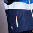 Vue de la poche zippée de la veste impermeable et reflechissante Le Temps des Grenouilles