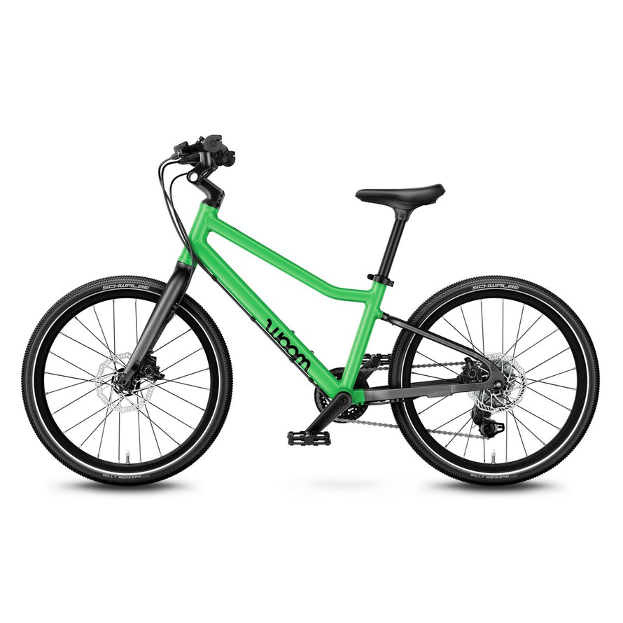 Vélo enfant 20 pouces woom explore 4 vert profil gauche pour enfants 6 à 8 ans tout terrain