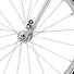 Gros plan sur la roue avant du velo enfant 20 pouces Woom GO 4 a 4 vitesses pour 6 a 8 ans