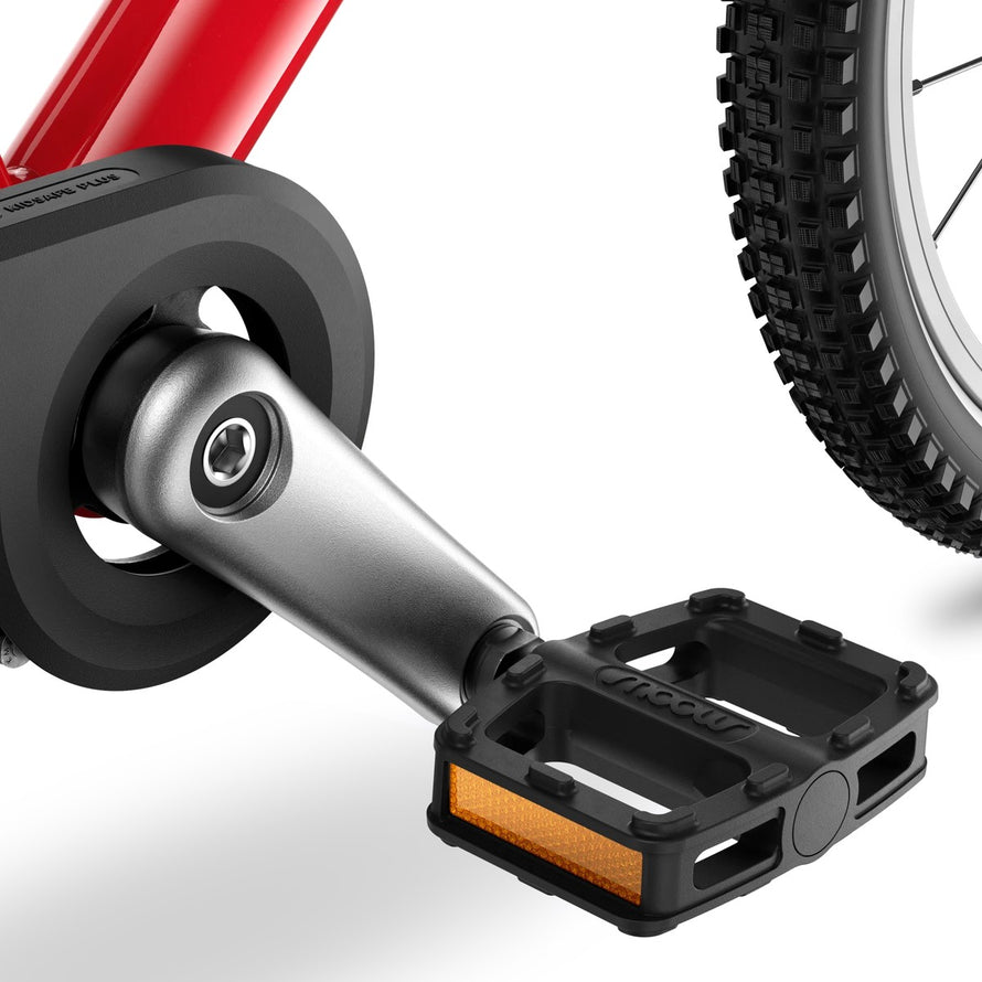 Pedale noire avec reflecteur orange du velo enfant Woom 4-6 ans modele GO 3 pour securite et confort